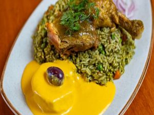 Arroz con pato con papa a la huancaína